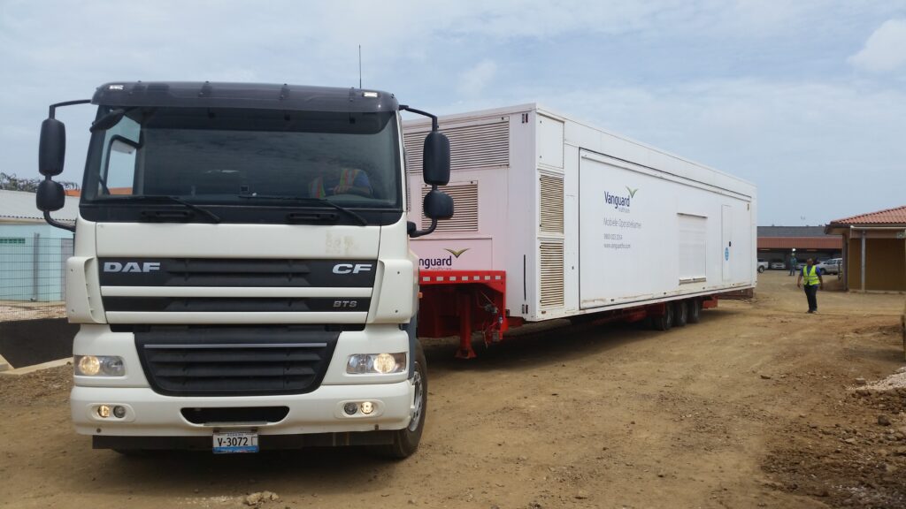 A mobile operating theatre travelling by road in the Caribbean